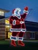 waving Santa outdoor light decoration in action