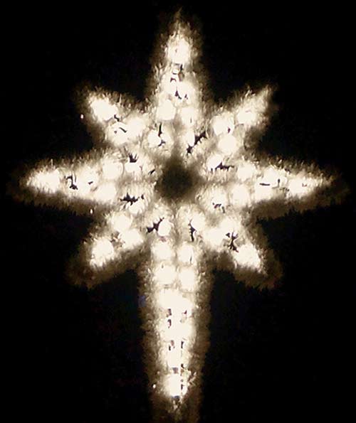 Large Hanging Star of Bethlehem with fine cut commercial garland and warm white LED lights