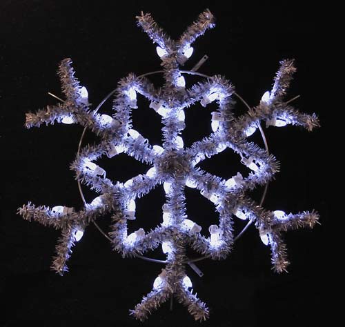 Versatile 3 feet hanging snowflake featuring pure white C7 LED lights