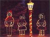 Carolers and Lamppost with Lantern Light Display